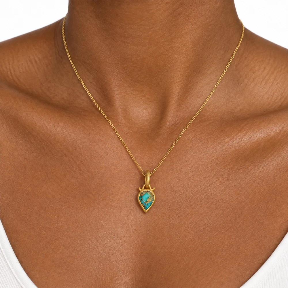 Ashk Pendant | 24k gold pendant on a model
