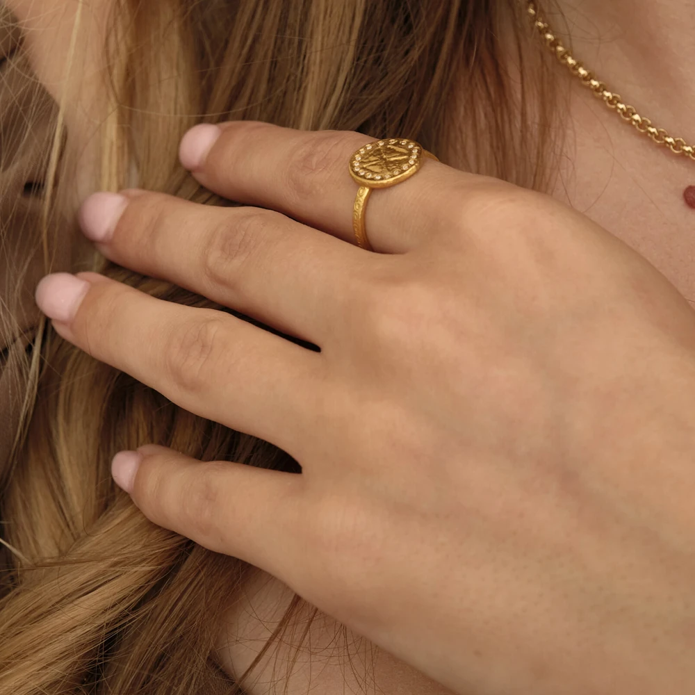 Era Ring | 24k gold ring on a model
