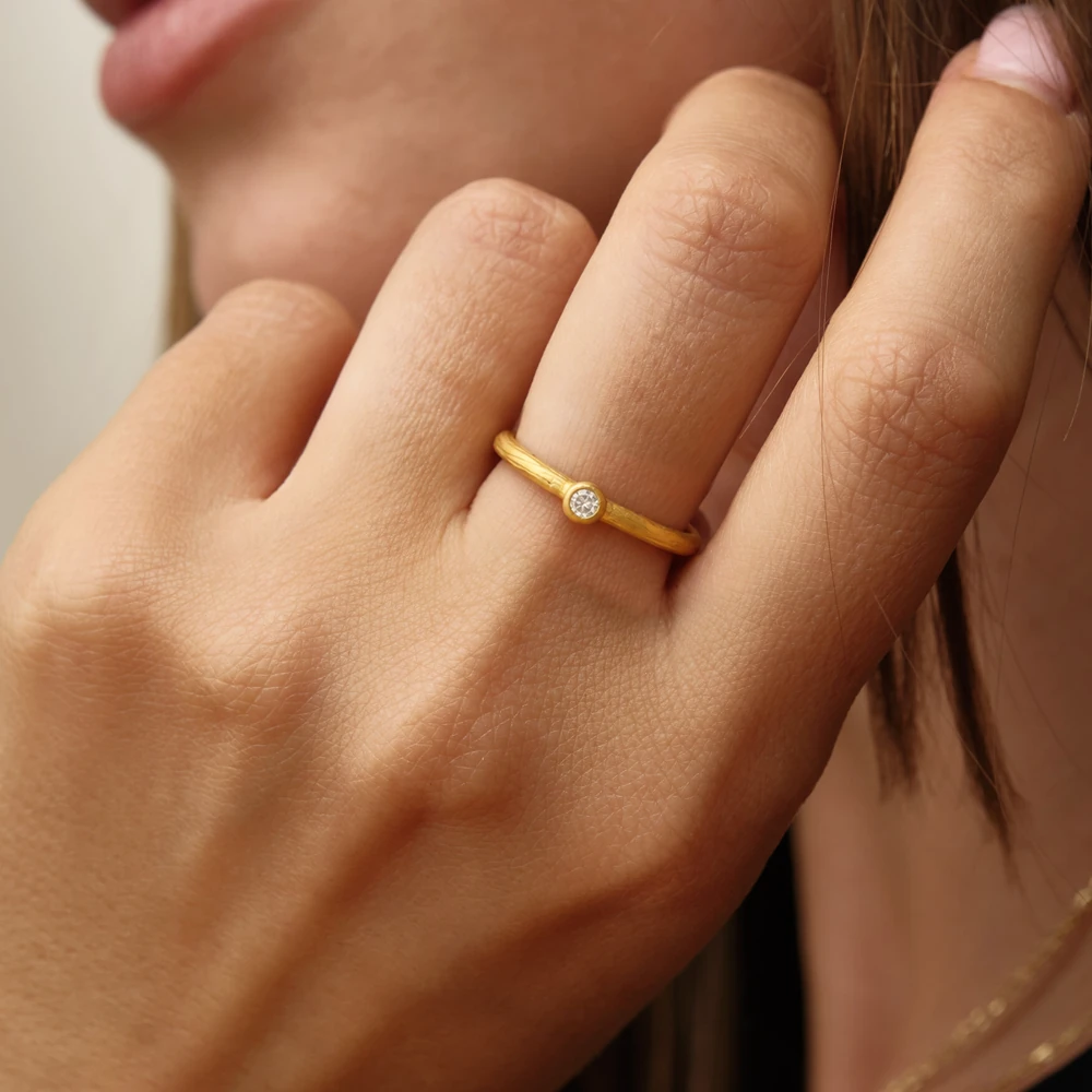 Romena Ring | 24k gold ring on a model