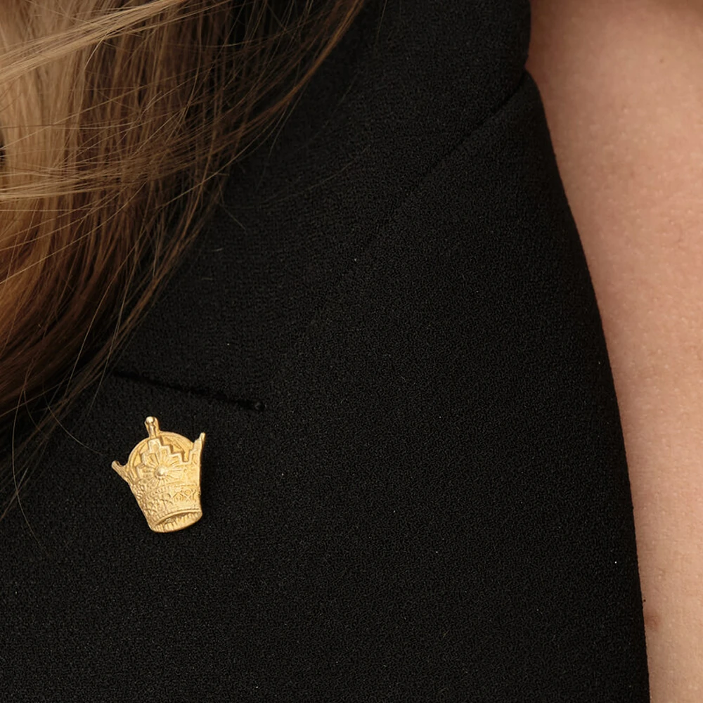 Taj Brooch | 18k gold brooch on a model
