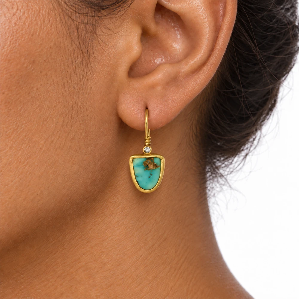 Firoozeh Earring | 24k gold earrings on a model