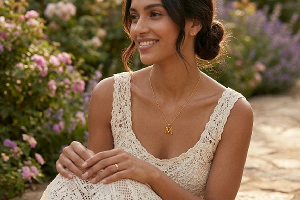 Minimalist Chic: Let Your 24k Gold Pendant Shine Solo